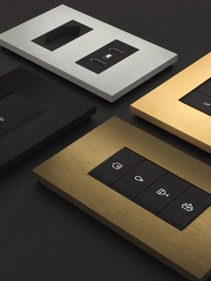 A selection of Roehn keypads in various premium finishes like brushed bronze, gold, and matte black. This highlights the bespoke, design-forward approach I take to ensure control interfaces complement your home's aesthetic.