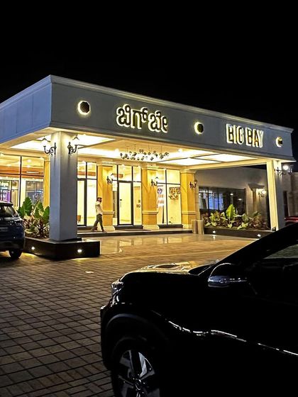 The elegant lighting of our main entrance at night, welcoming travelers to a safe and comfortable stop.
