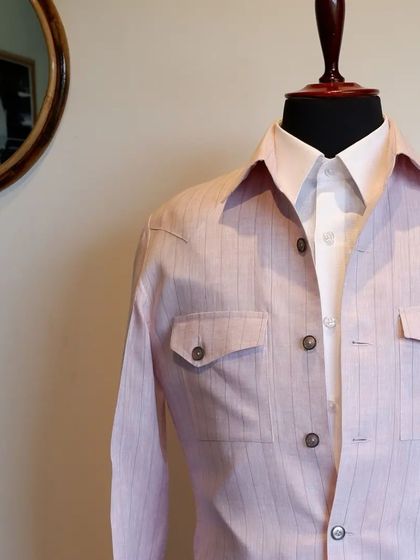 This piece is perfect for a summer day, offering a light, breathable, and stylish option for the modern man.