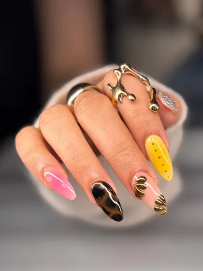 Another angle of the eclectic, multi-patterned nail art. This is for the client who isn't afraid to experiment and have fun with their nails.