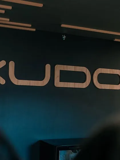 The Kudos logo on the wall of our office. This is where the planning and creative brainstorming for our massive events happens.