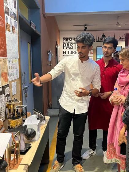 Students presenting their lighting fixture designs and models to the jury. This project challenged them to think about form, function, and the interplay of light and shadow in architectural spaces.