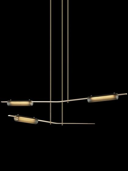 A studio shot of the linear Volant configuration against a black background, ideal for illuminating dining areas or kitchen islands.