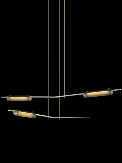A studio shot of the linear Volant configuration against a black background, ideal for illuminating dining areas or kitchen islands.