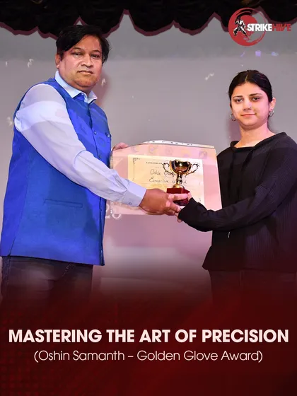 A student is awarded the "Golden Glove Award" for mastering the art of precision in her striking.