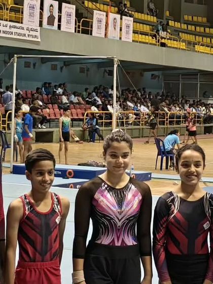 More moments of triumph from various competitions, showcasing our gymnasts with their medals, trophies, and proud coaches.
