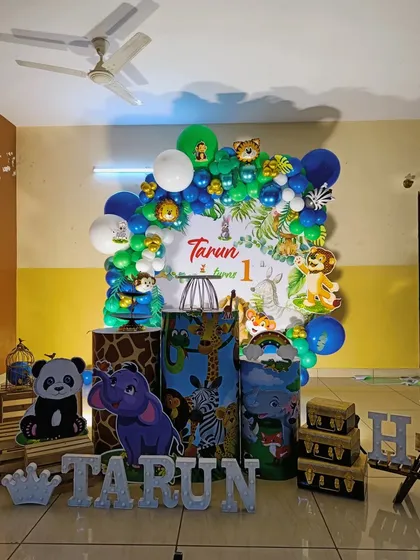 Another view of Tarun's party setup, highlighting the different animal props like the panda and elephant.