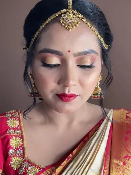 A closer look at the eye makeup for a Muhurtham ceremony. I used a beautiful gold shimmer on the lids to catch the light, defined with a sharp wing liner to make her eyes the focus.