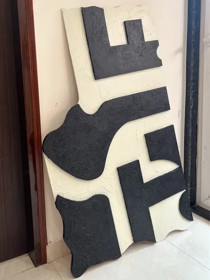 The full view of the custom-shaped black and white textured piece. Working with MDF board allows me to break free from the traditional rectangle and create truly unique shapes.