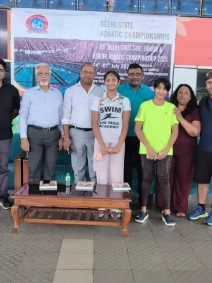 Our team, including gold medalist Amiera Singhal, with officials at the Junior Delhi State Swimming Competition. It takes a community to build a champion.