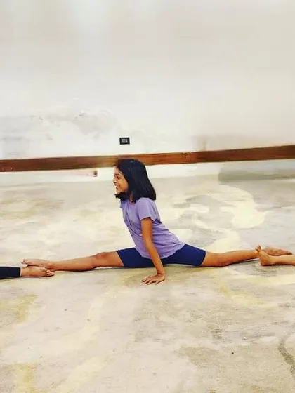 Look at this amazing display of teamwork and flexibility. Our students are practicing their middle splits together, motivating each other to reach their goals in a fun and supportive group setting.