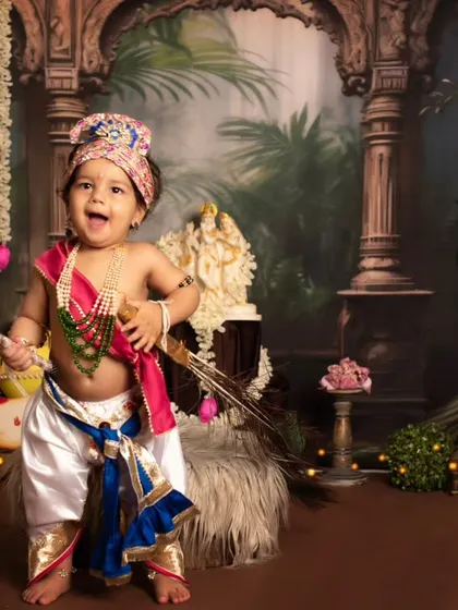 We celebrate culture and tradition with special photoshoots, like for Janmashtami. Here, a happy little Kanha is ready for some fun in our beautifully arranged festive set.