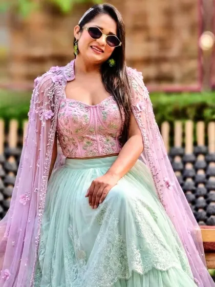 A pastel-themed look for a Mehendi carnival at JP Hotel, Mussoorie. The soft colors and intricate embroidery of the lehenga were perfect for a daytime event in the hills.