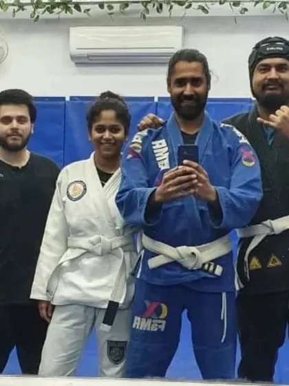 A mirror selfie with some of our dedicated students after a Gi and No-Gi session.