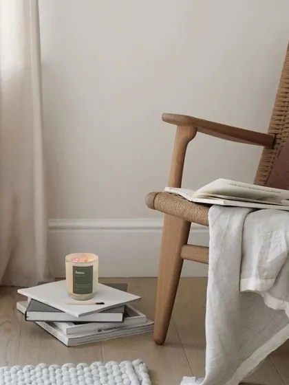 A serene corner featuring one of our jar candles. From fresh and fruity to warm and spicy, we have a scent for everyone.