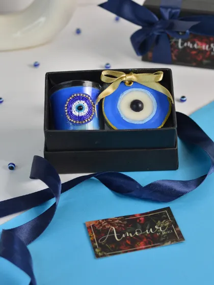 Step into a world of positive energy with my Evil Eye Gift Box. This set includes a handcrafted candle and a wax sachet, making it a perfect blend of charm and protection.