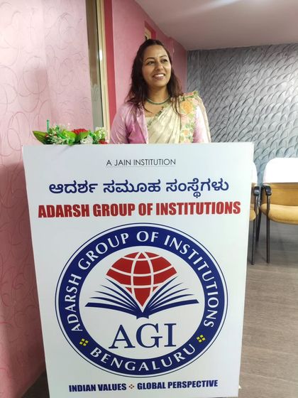 At the podium for the Pragya Samaj Felicitation Ceremony, held at Adarsh Group of Institutions. I am comfortable and confident taking the lead at formal institutional events.