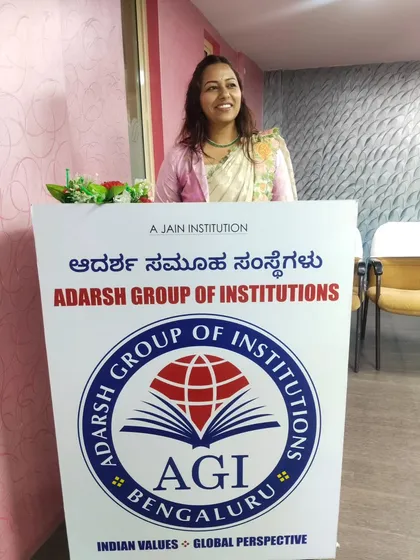 At the podium for the Pragya Samaj Felicitation Ceremony, held at Adarsh Group of Institutions. I am comfortable and confident taking the lead at formal institutional events.