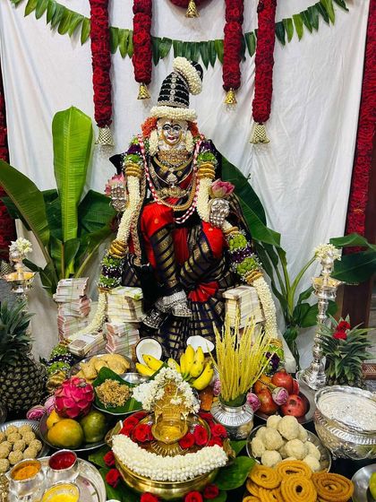 The full view of this magnificent Varamahalakshmi pooja, where our saree adds to the splendor and sanctity of the occasion.