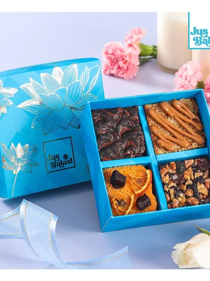 Our 'Mini Celebration Box' for Rakhi, filled with four different types of our signature brownies. A perfect, indulgent gift for your sibling.