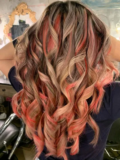 Peach fuzz perfection. This was a color correction where we used bleach and tone to create this peachy, creamy mix of colors.