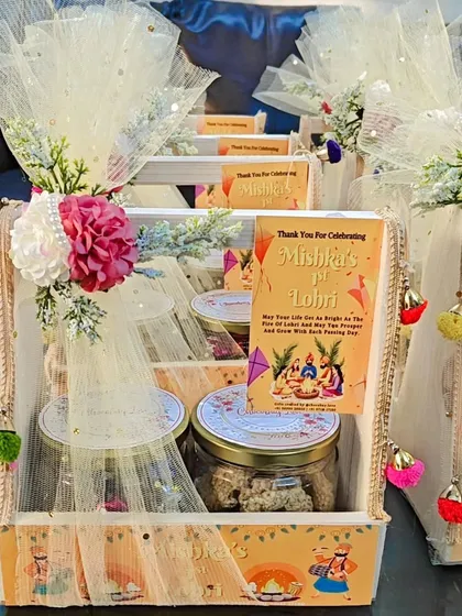 Another angle of the beautiful "Mishka's 1st Lohri" hamper, showing the delicate floral and pearl decorations.