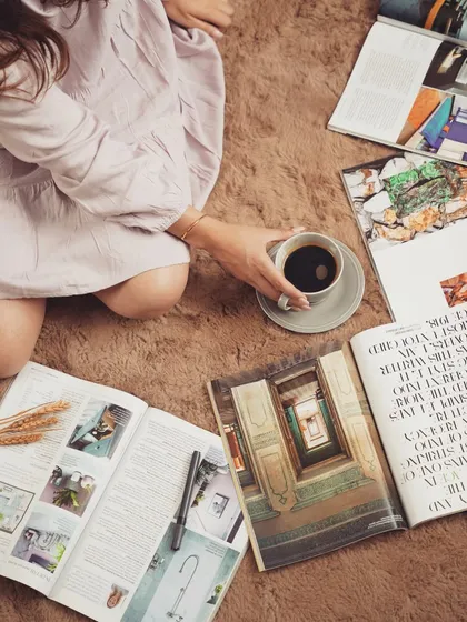 Sometimes, the best way to find inspiration is to ditch Pinterest for some old-school research. Here I am, flipping through design magazines with a cup of coffee, gathering ideas.