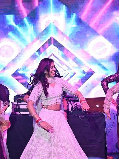 The groom's sisters performing a high-energy 'Do Dhaari' number. We choreograph for all family members, not just the bride and groom's side.