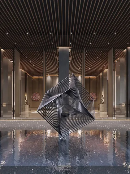 The entrance to a building tells its first story. For the One Marina residential tower, we designed this dramatic water feature and sculpture to create a sense of arrival and grandeur, setting the tone for the refined luxury that awaits within.