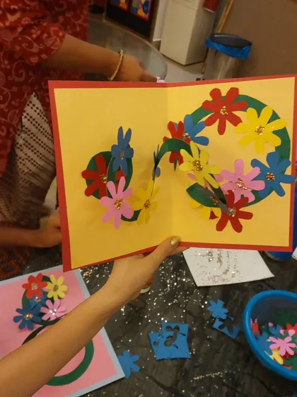 A close-up of a beautiful, handmade pop-up floral card for Mother's Day. These heartfelt creations are the best gifts.