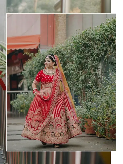 An artistic shot of Payal, her full lehenga framed by lush green foliage, creating a beautiful contrast.