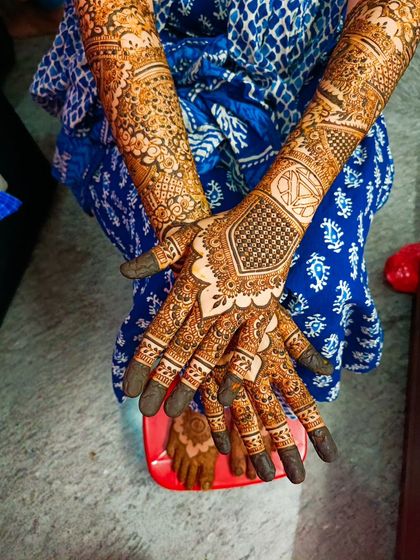 A full view of the intricate Marvel-themed design on both hands.