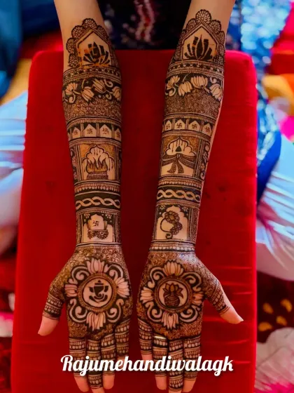 This design is centered around Lord Ganesha, with a beautiful mandala-style portrait on each palm. The arms feature other auspicious symbols for a blessed start.