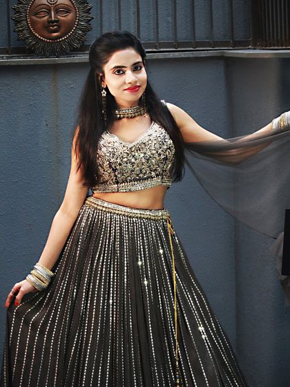 A full-length shot of the black and silver lehenga, perfect for a cocktail party or reception.