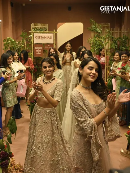 The finale of the fashion show at our Ahmedabad launch. The joy and applause reflect a successful night of beauty, glamour, and timeless style.