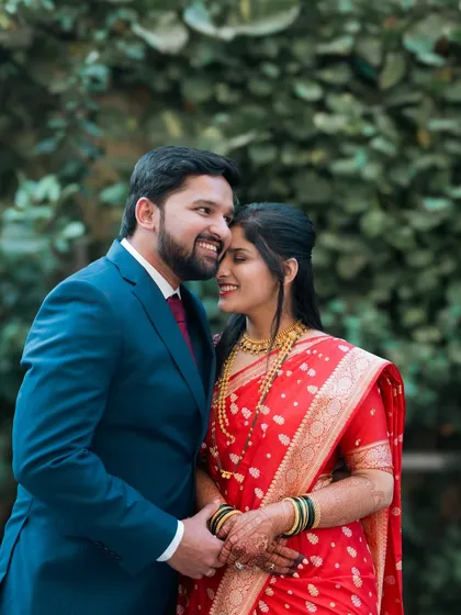 A sweet embrace between a couple in their reception attire.