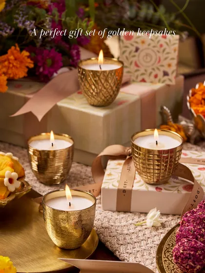 A perfect gift set of golden keepsakes. These Metallic Votive Candles were inspired by ancient coins, transforming their timeless beauty into vessels that hold not currency, but light and memory.