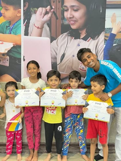 I'm so proud to stand with these summer camp achievers. Seeing them grow in skill and confidence is the most rewarding part of my job.