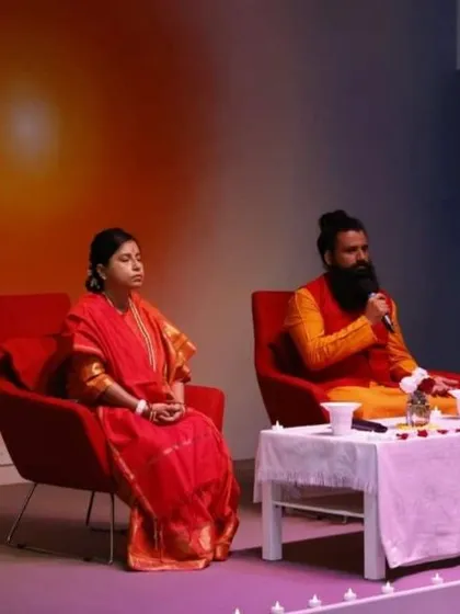 A close-up of us leading a Siddha Healing and Meditation session in Sydney. Guruji is speaking while Maa is in a meditative state, showing the combined energies we bring to our healing work.