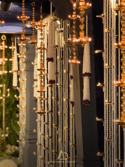 A duplicate of the previous image, showing the beautiful light from the hanging diyas.
