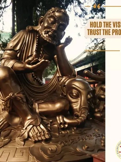 A statue of Bodhidharma, the patriarch of Zen Buddhism and Shaolin Kung Fu. His teachings emphasize that true skill comes from discipline and trusting the process of repetition.
