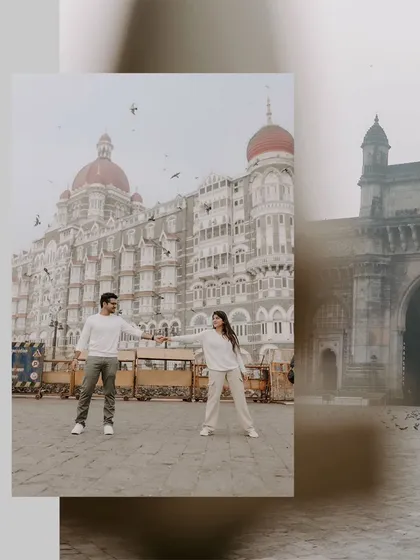 A creative, layered composition of a couple at the Gateway of India, blending the iconic architecture with a sense of movement and modern style.