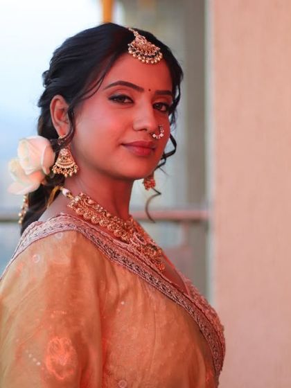 A side profile showcasing the beautiful braided hairstyle adorned with a white rose. This demonstrates my attention to detail in creating a complete, 360-degree look.