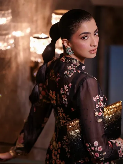 This look was created for a Rahul Mishra show at India Couture Week. I designed a sharp, structural bubble ponytail to complement the intricate and modern aesthetic of the collection. This style showcases my ability to create high-fashion, runway-ready hair.