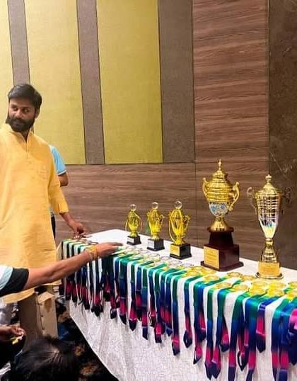 Preparing the awards for the championship. Recognizing the efforts of every participant is crucial in fostering a positive and encouraging competitive environment.