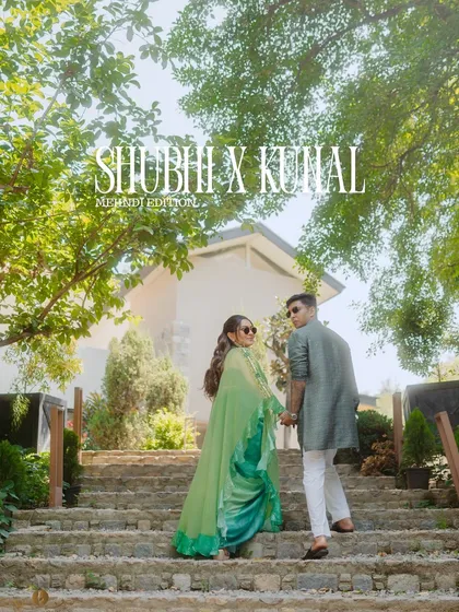 A stylish, magazine cover like shot of the couple walking up the stairs at their mehndi venue. This shows our creative approach to couple portraits.