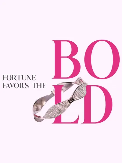 Fortune favors the bold. This twisted, sparkling bangle is a statement of confidence and style.