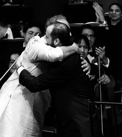 A heartfelt hug with the conductor after our performance in Ecuador. These are the moments of connection that make a musical journey so special.