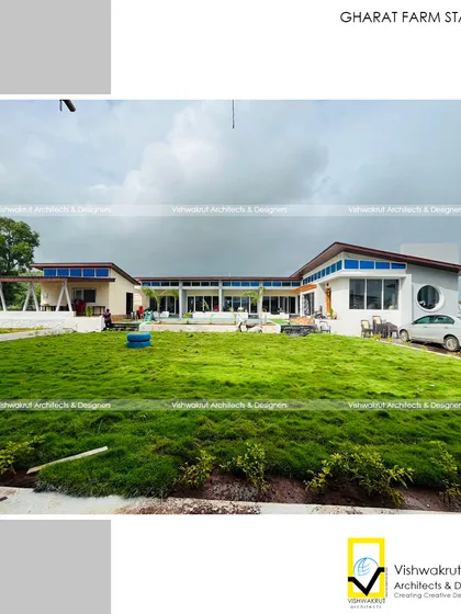 The Gharat Farm Stay in Pali, where my goal was to build in harmony with nature. This wide view shows how the structure integrates with the lush landscape, featuring expansive lawns and open architecture that respects the natural contours of the land.