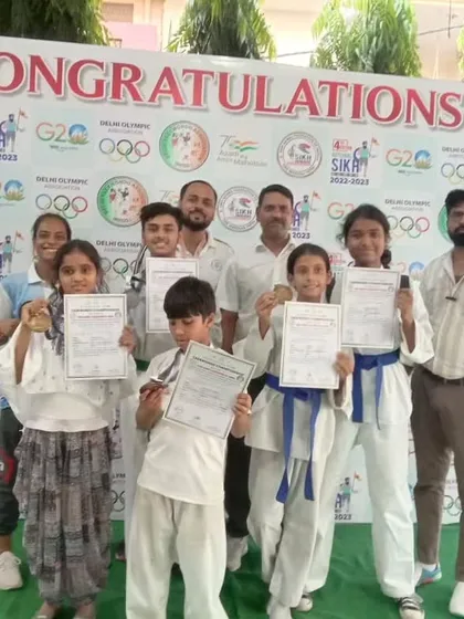 Our athletes proudly displaying their medals and certificates at the National Sikh Games. We train for results, and our team delivered.